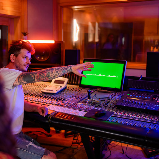music technician raised hand during recording