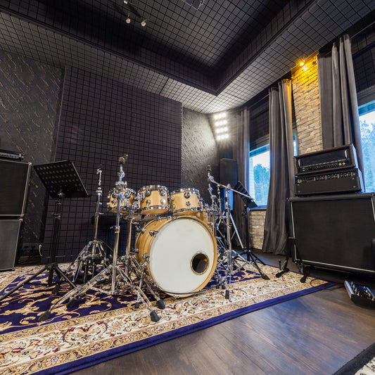 drum set in a professional studio to record sound