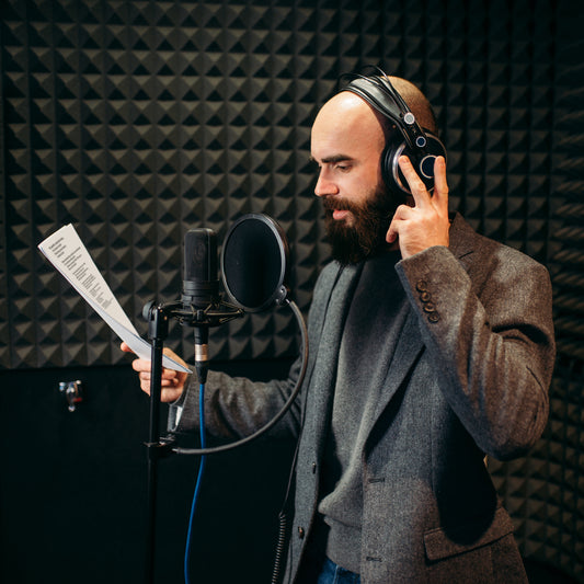 male singer songs in audio recording studio
