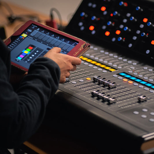 man is using a tablet computer in a professional eq