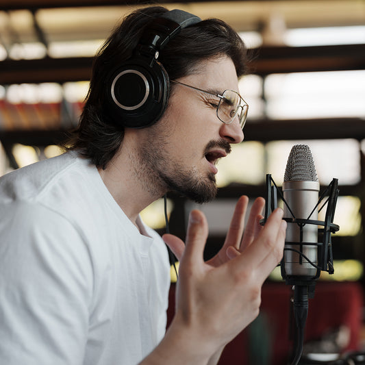man singing in recording studio
